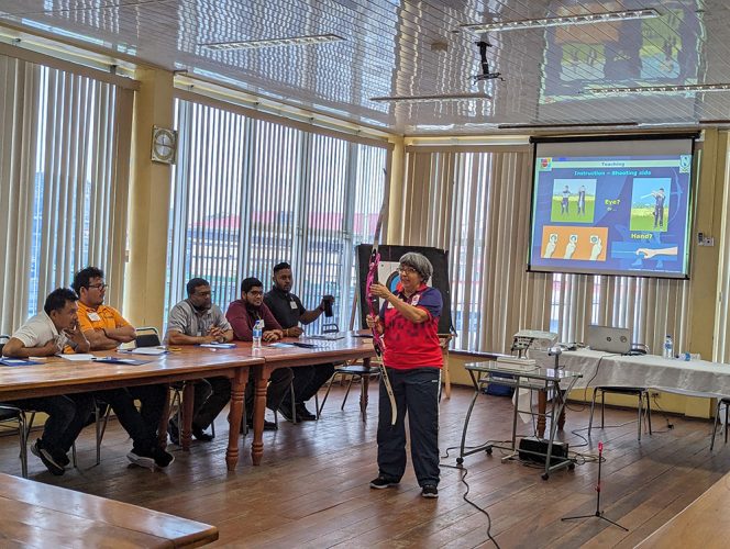 International World Archery Training Ludys Carina Tejada explained a detail to the gathering at the Olympic Solidarity Archery Coaching Course