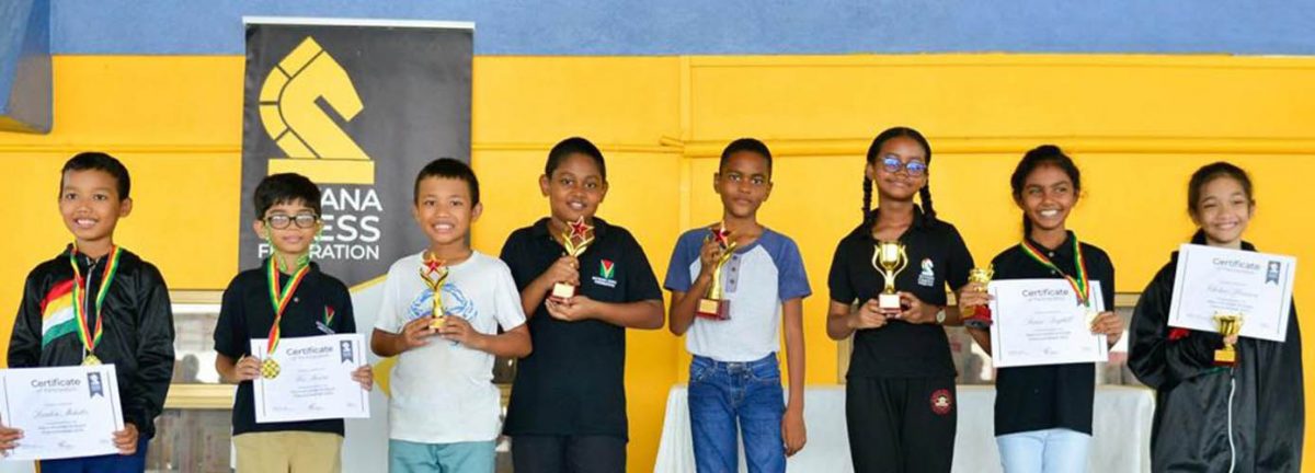 The respective winners and top three finishers in the Open and Girl’s Divisions, respectively, in the National U12 Chess Championships