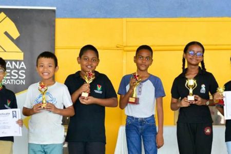 The respective winners and top three finishers in the Open and Girl’s Divisions, respectively, in the National U12 Chess Championships