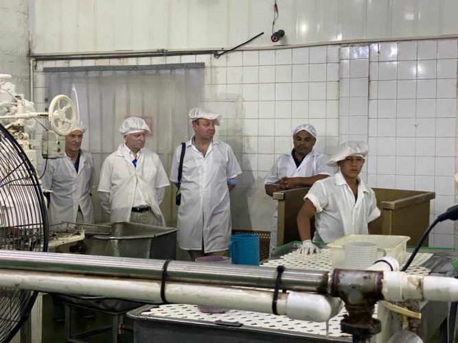 The visiting senators are seen in the Amazon Caribbean (AmCar) heart of palm factory situated on the Barima River