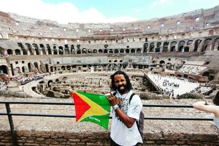 Gavin Mendonca with Guyana’s flag in Ireland
