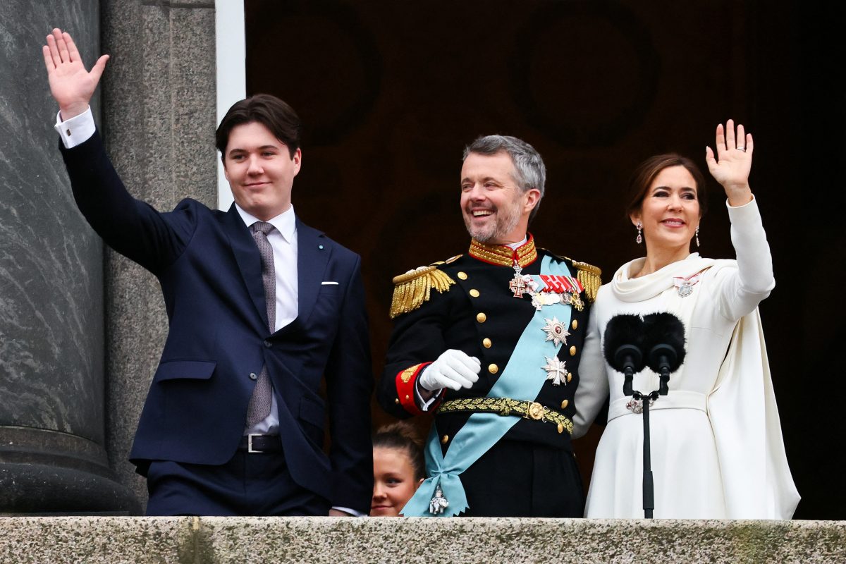 Denmark's newly proclaimed King Frederik and Queen Mary, appear on the balcony of Christiansborg Palace with Prince Christian, following the abdication of former Queen Margrethe who reigned for 52 years, in Copenhagen, Denmark, January 14, 2024. REUTERS/Wolfgang Rattay