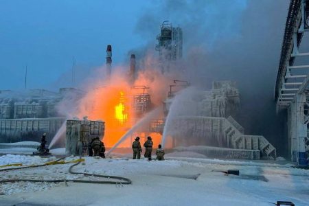 Firefighters work to extinguish fire at the Novatek terminal in the port of Ust-Luga, Russia, January 21, 2024. Leningrad Region's Governor Alexander Drozdenko Telegram channel via REUTERS