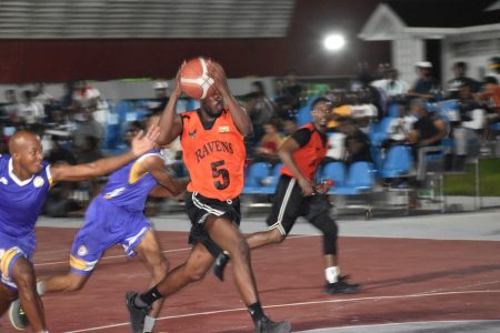 Part of the action in the ‘One Guyana’ Basketball Premier League conference encounter between the Ravens and Pacesetters
