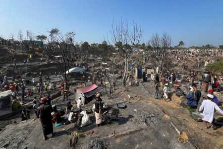 Rohingya refugees work on rebuilding their makeshift shelters after a fire broke out in a camp in Cox’s Bazar, Bangladesh, January 7, 2024. (Reuters photo)