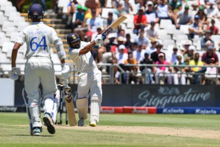 Rohit Sharma heaves through the leg-side as he saw India home with an unbeaten 16