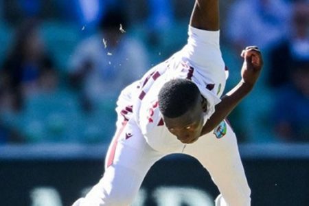 West Indies fast bowler Shamar Joseph in full flight during his spell against Australia on the first day of the first Test on Wednesday in Adelaide. (CWI Media photo)