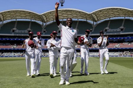 Shamar Joseph (centre) became only the 10th West Indian to snare five wickets in a test on debut