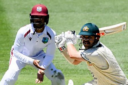  Travis Heads bats during the first Test against West Indies
