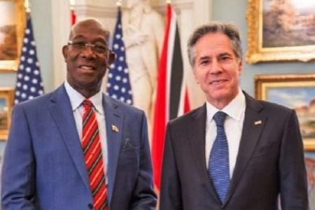 JOINING FORCES: Prime Minister Dr Keith Rowley, left, and US Secretary of State Antony Blinken pose for a photo following their meeting on  Monday at the State Department in Washington, DC. —Photo: Office of The Prime Minister
