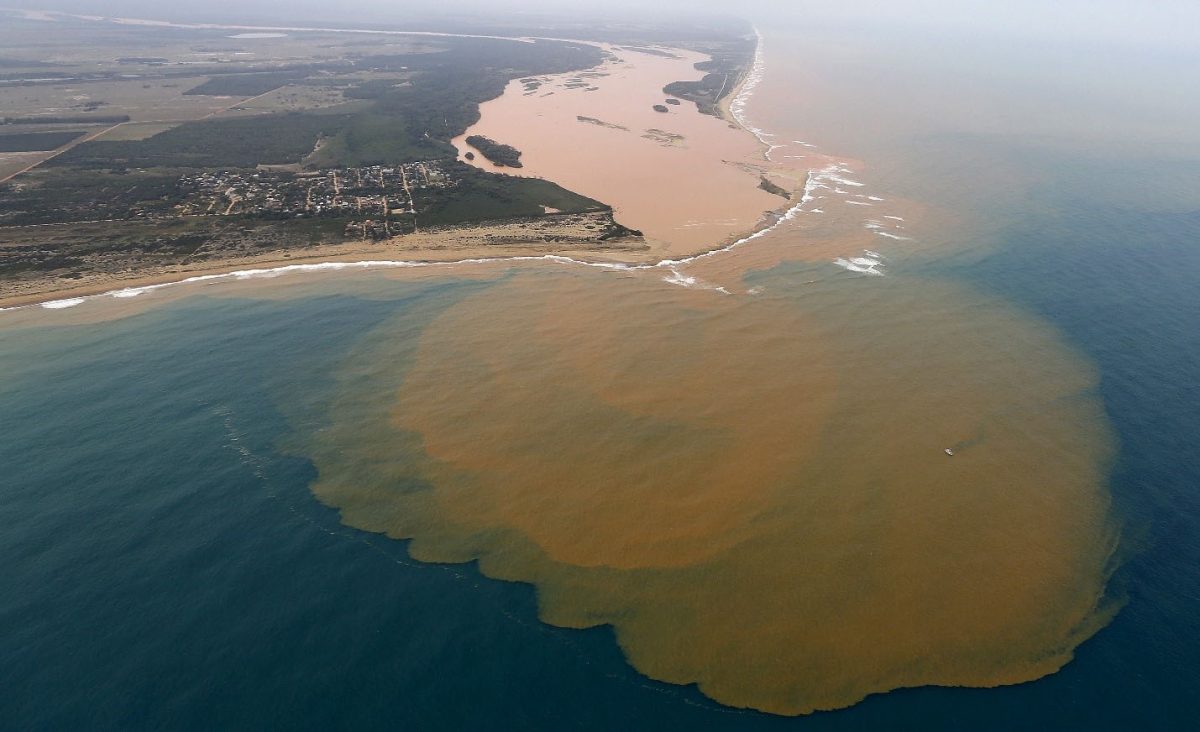 An aerial view of the Rio Doce (Doce River), which was flooded with mud after a dam owned by Vale SA and BHP Billiton Ltd burst, at an area where the river joins the sea on the coast of Espirito Santo in Regencia Village, Brazil, November 23, 2015. REUTERS/Ricardo Moraes/File