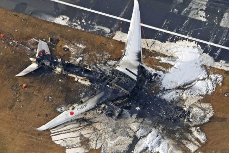 Daytime aerial photos show the burned out wreckage of the Japan Airlines plane at Haneda airport on Wednesday, Jan. 3, 2024, in Tokyo, Japan. Kyodo News/AP
