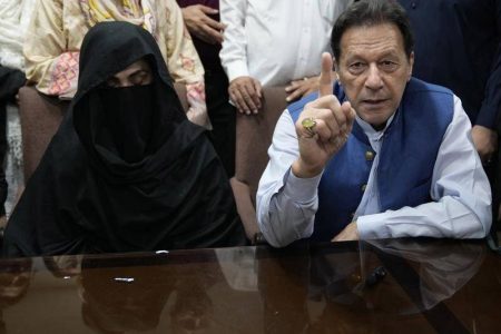 Pakistan's ex-PM Imran Khan and his wife Bushra Bibi have been sentenced to 14 years for corruption. (AP PHOTO)