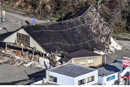 This building in Nanao, in the central Japan prefecture of Ishikawa, was knocked down by a strong earthquake that rocked a wide area on the Sea of Japan coast on Jan. 1.   © Kyodo