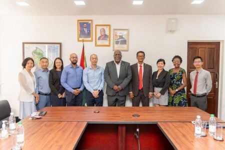 Prime Minister Mark Phillips is sixth from left in this Office of the Prime Minister photo.