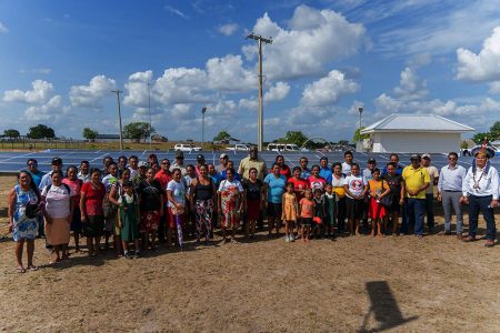 The Prime Minister with residents at the commissioning of one of the farms (Office of the Prime Minister photo)
