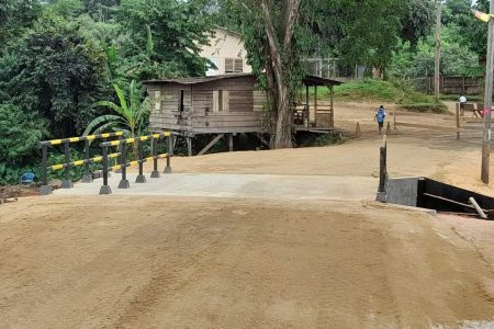 A new concrete bridge at Matthews Ridge ‘Flat’, located in Region One, has been completed.  This bridge was one of the commitments made by President Irfaan Ali when he visited the area. (Office of the President photo)