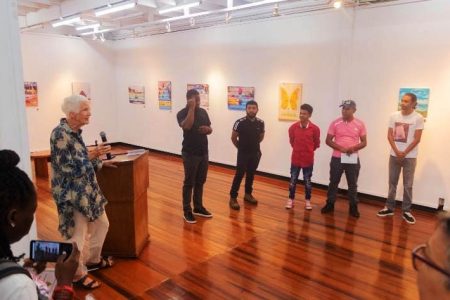 Member of the deaf association Sabine McIntosh
speaking at the opening of the art exhibit.
