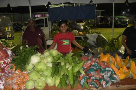 A packed table at the Farmers Market at the Police Sports Club Ground early yesterday morning. (Police photo)