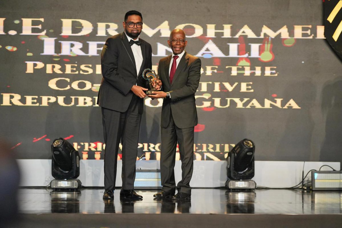 President Irfaan Ali (left) receiving the award (Office of the President photo)