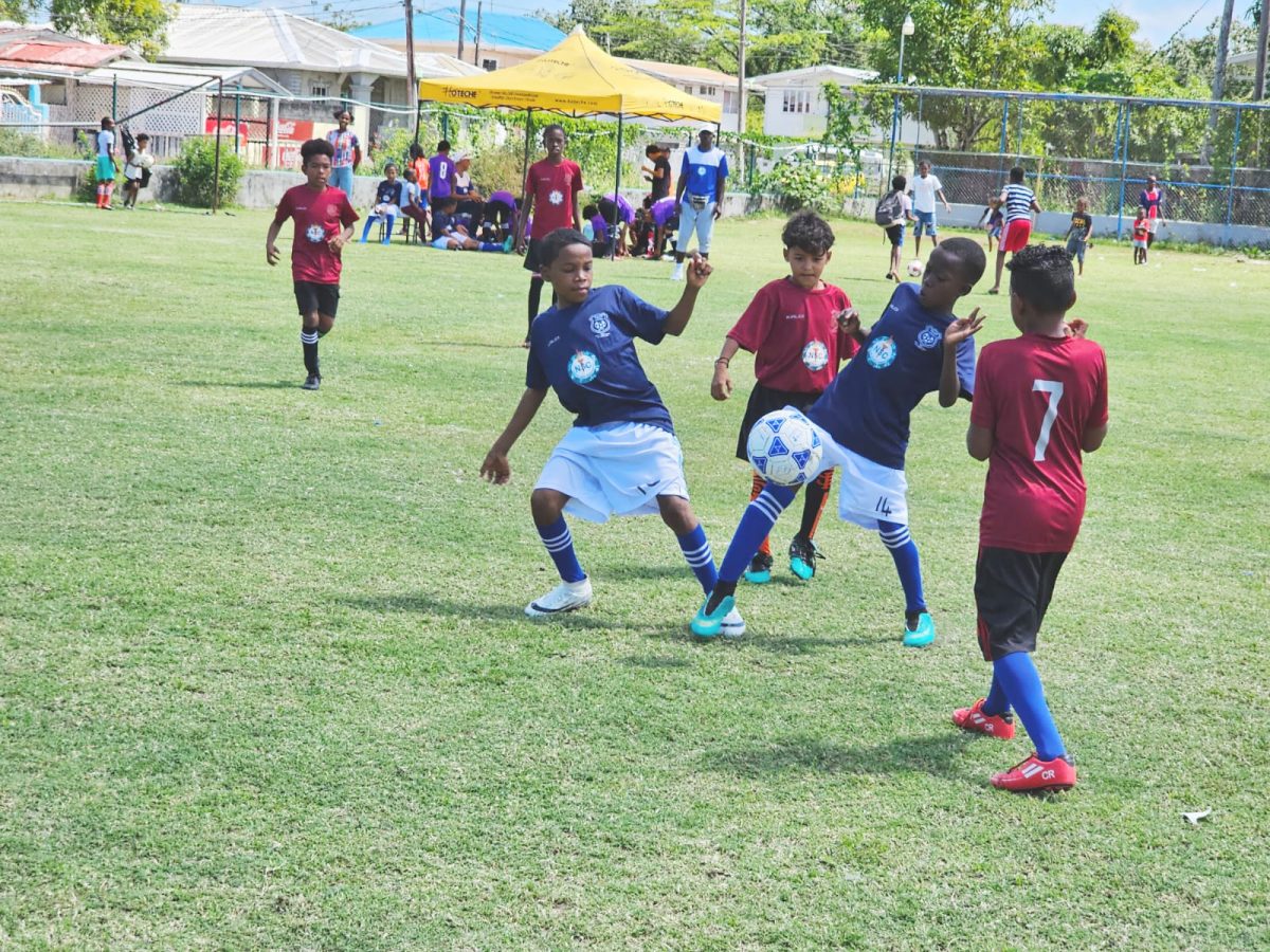 Friendship All-Stars (in blue) during their match against Kick Start Academy. 