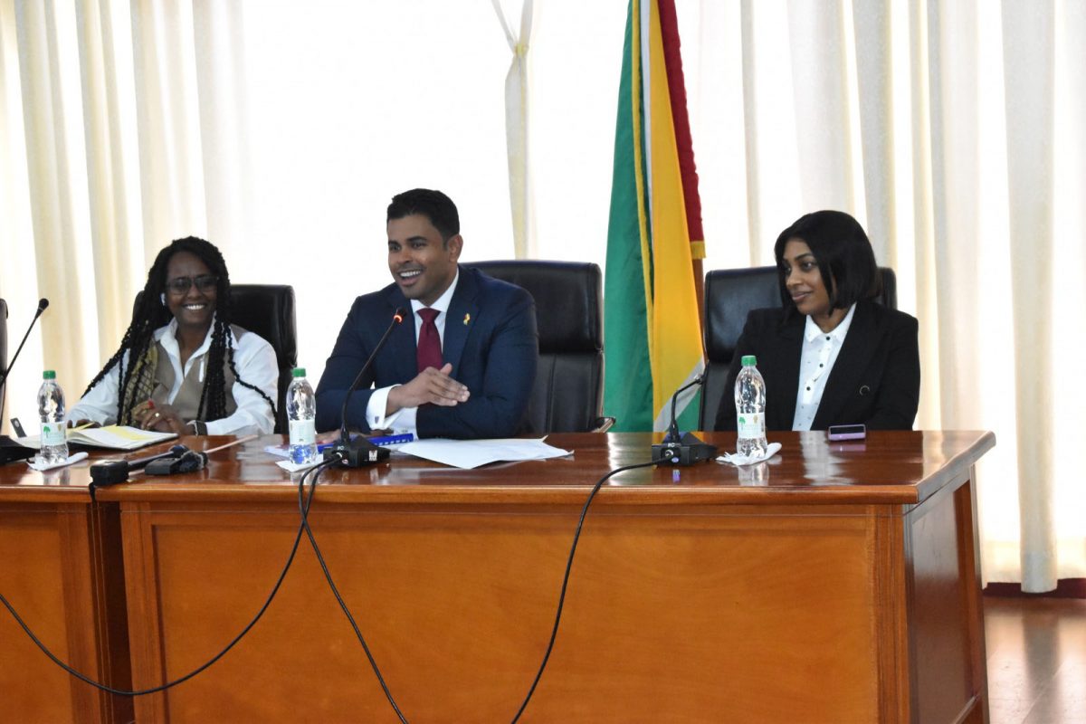 Minister of Culture, Youth & Sport, Charles Ramson Jr. (centre) at the press briefing on Friday