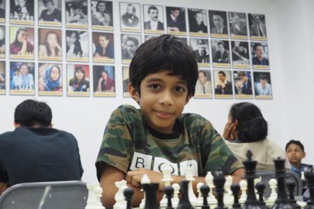 Aswath Kaushik, 8, became the youngest player ever to defeat a grandmaster.
