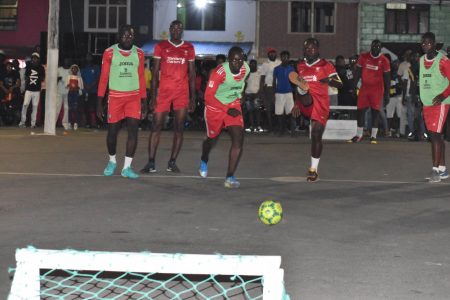 Goal bound! David George of California Square in the process of scoring from the penalty shot against Victoria Eagles in the ‘Georgetown versus the Rest’ Street-ball championship