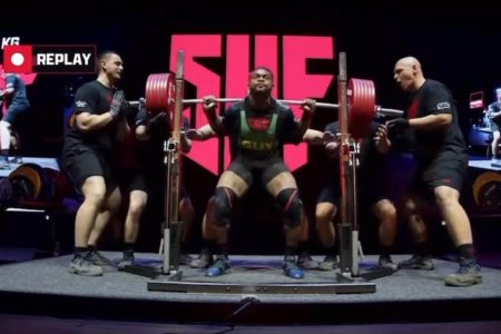 Carlos Petterson-Griffith in the process of recording his then-world-record squat of 332.5kg at the 2024 Sheffield Powerlifting Championship in England.