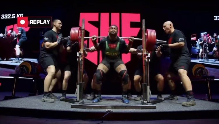 Carlos Petterson-Griffith in the process of recording his then-world-record squat of 332.5kg at the 2024 Sheffield Powerlifting Championship in England.