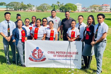 Guyana Golf Association (GGA) President Aleem Hussain (5th from right) posing with members of the CPCE golf programme at the announcement Chip, Putt and Drive Open Tournament