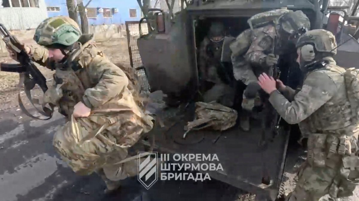 Ukrainian soldiers get out of a military vehicle in a location given as Avdiivka, Donetsk Region, Ukraine, in this screen grab taken from a video released February 17, 2024. 3Rd Assault Brigade/Handout via REUTERS