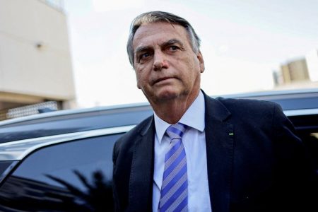 FILE PHOTO: Former Brazilian President Jair Bolsonaro leaves the Federal Police headquarters after testifying about the January 8 riots, in Brasilia, Brazil, October 18, 2023. REUTERS/Ueslei Marcelino/File Photo