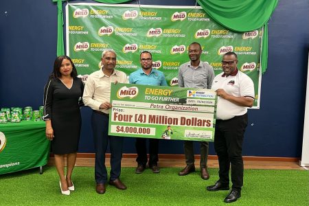 Nestle’s Senior Business Manager Teisha Milner (1st from left), Massey CEO Navin Thakur (2nd from left), Nicholas Fraser (centre), Administrator of the Allied Arts Unit, GFF Vice-President Dion Innis (4th from left), and Petra Organisation’s Co-Director Troy Mendonca pose for the cameras at the launch of the 10th Milo Schools U-18 Football Tournament