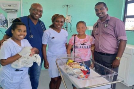 Part of the team that worked with the Rodrigues family. Zenella Rodrigues is second from right.
