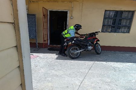   A police officer waiting outside whilst his colleague was in the office of the head teacher at St Paul’s Primary School.