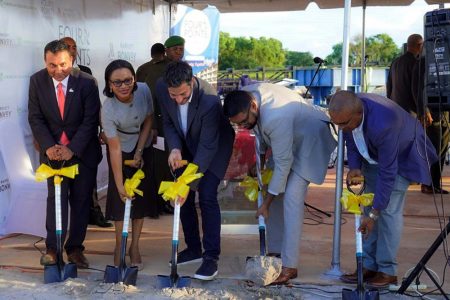 President Irfaan Ali (second from right) along with Andres Botero (centre), the Minister of Tourism Oneidge Walrond (second from left), and G- Invest CEO Peter Ramsaroop (left) turning the sod for the Four Points by Sheraton Hotel at Houston on July 19, 2022. (Office of the President photo)