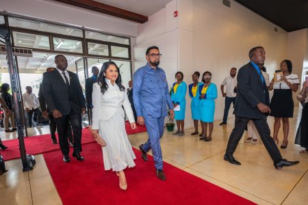 President Irfaan Ali and First Lady Arya Ali arrive for the opening of the 46th regular meeting of the Conference of Heads of Government of the Caribbean Community yesterday at the National Cultural Centre. 