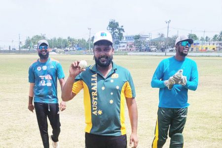 Hat-trick hero! Omesh Danram walks off to the applause of his
teammates after running through the GNIC batting line-up.
