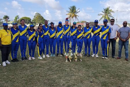 The victorious Demerara women’s team pose with their GCB Inter-County Women’s T20 trophy along with officials from the GCB