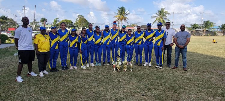 The victorious Demerara women’s team pose with their GCB Inter-County Women’s T20 trophy along with officials from the GCB