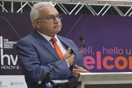 Health Minister Terrence Deyalsingh touches his chest as he spoke during the U-Health and Wellness Expo 2024 at Hyatt Regency, Port-of-Spain, yesterday.
