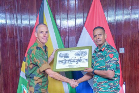 GDF Chief of Staff Brigadier Omar Khan (right) with the Netherlands’ Defence Attaché for Suriname and Guyana, Commander (Navy) Geordie Klein. (GDF photo)