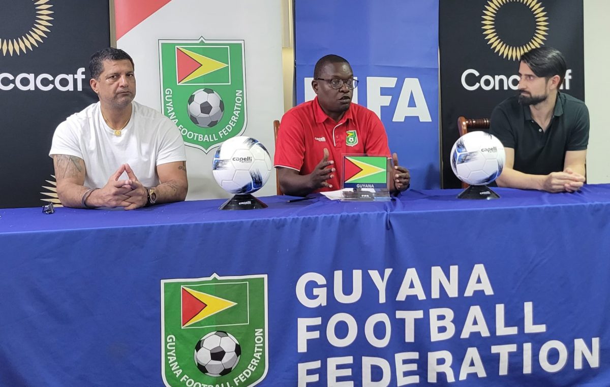 GFF Technical Director Bryan Joseph (centre) made a point at the gathering in the presence of UEFA Pro Licence Coach Rubén de la Red (right) and Racing Madrid FC President Steve Nijjar