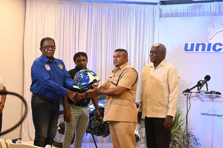 One of the helmets being handed over. (Ministry of Home Affairs photo)
