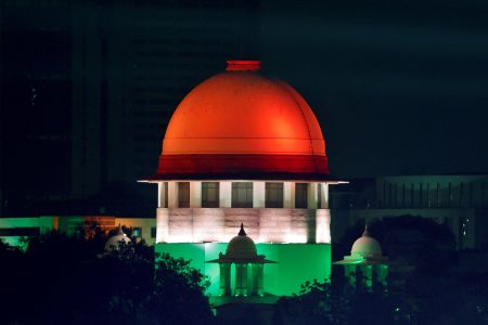 Illuminated Supreme Court building is pictured from the International Media Center during the G20 Summit in New Delhi, India, September 9, 2023. REUTERS/Amit Dave/File Photo