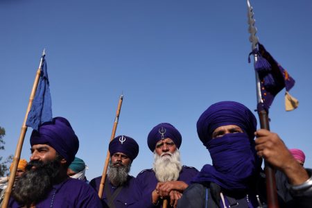 Nihangs or Sikh warriors listen to a speaker at a protest site where farmers are marching towards New Delhi to press for the better crop prices promised to them in 2021, at Shambhu Barrier, a border between Punjab and Haryana states, India, February 22, 2024. REUTERS/Francis Mascarenhas