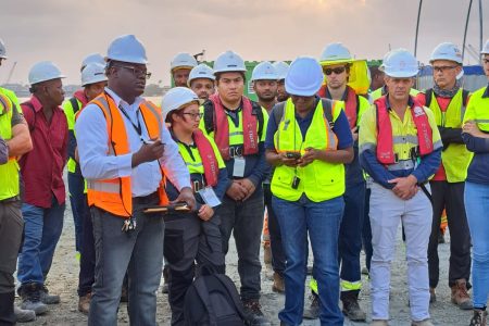 Labour officers on the site  with employees (Ministry of Labour photo)