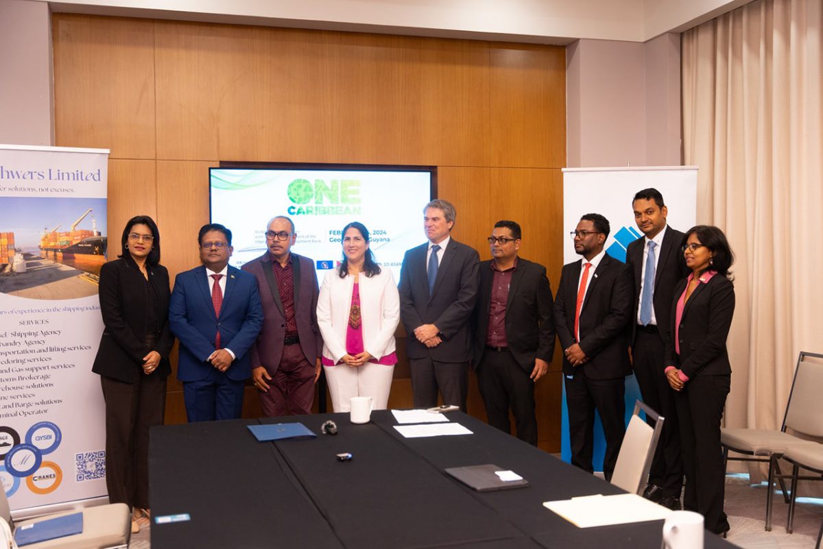 L-R GBTI’s Business Development Manager Rawattie Mohandeo;  Finance Minister Dr. Ashni Singh;  Muneshwer’s General Manager Chandradatt Chintamani; IDB Invest Country Manager Lorena Solazar; CEO James Scriven; GBTI deputy CEO Shawn Gurcharran and other representatives of IDB and Muneshwers