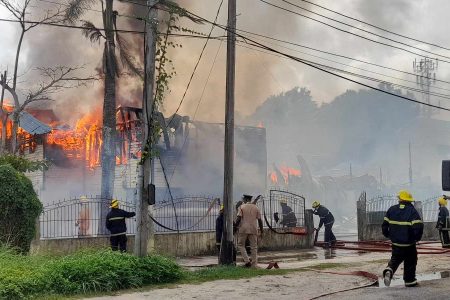 Firemen battling the blaze today.